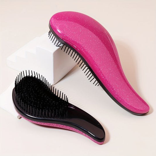 Brosse à cheveux rose et noir