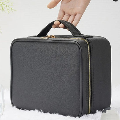 trousse maquillage noir main